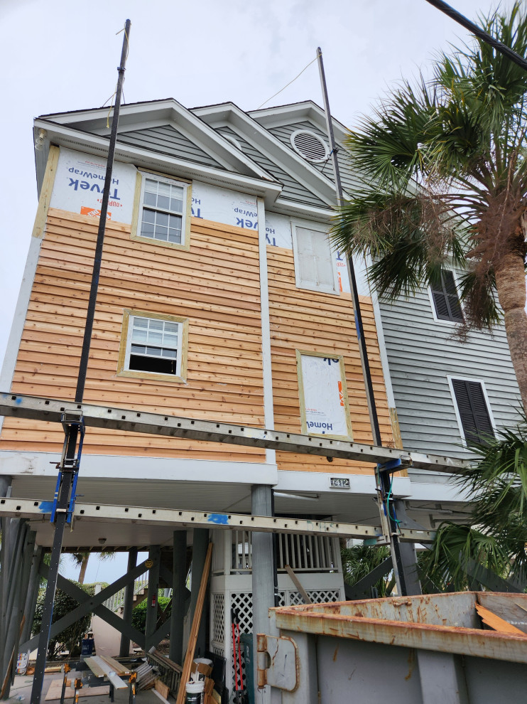 Exterior remodel / Windows / cider siding / paint
