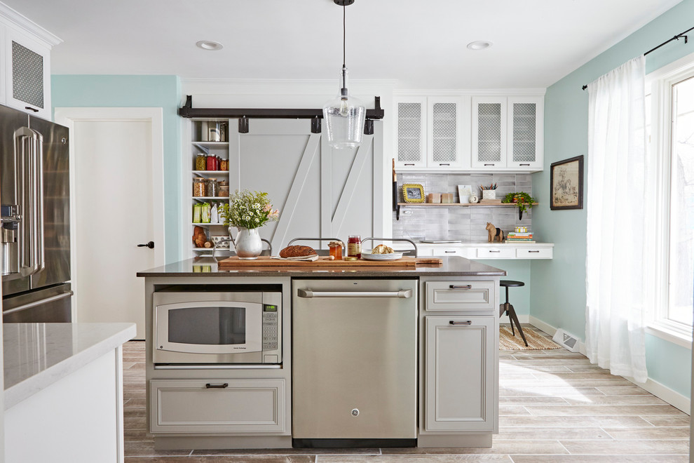 Inspiration for a large country kitchen in Other with quartzite benchtops, stainless steel appliances, ceramic floors, with island, recessed-panel cabinets, grey cabinets and grey benchtop.