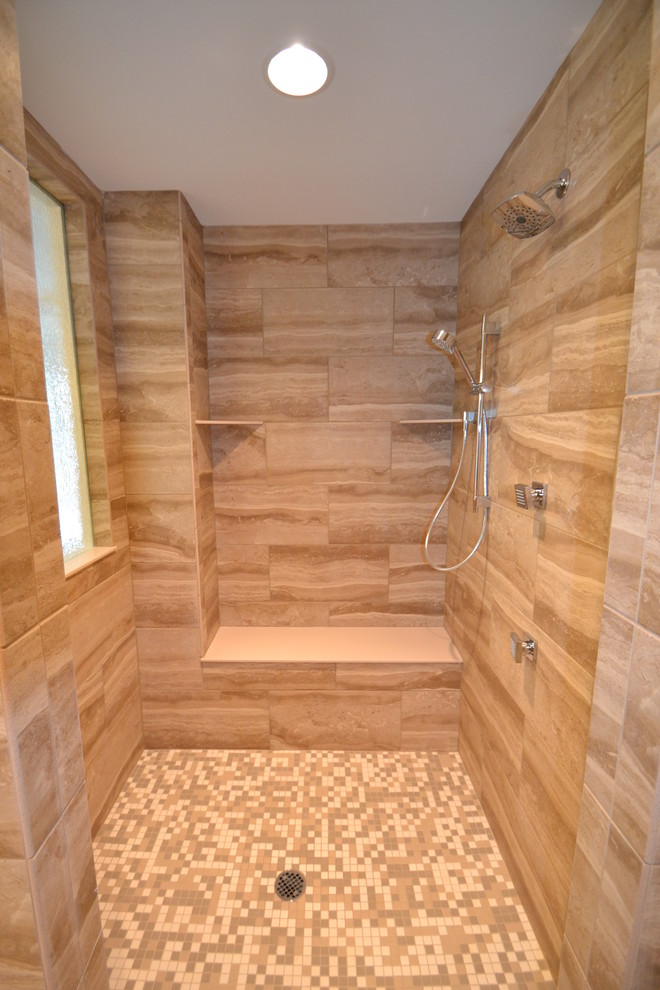 Mid-sized contemporary master bathroom in Indianapolis with an undermount sink, furniture-like cabinets, light wood cabinets, granite benchtops, a freestanding tub, an open shower, a two-piece toilet, brown tile, porcelain tile, grey walls and porcelain floors.