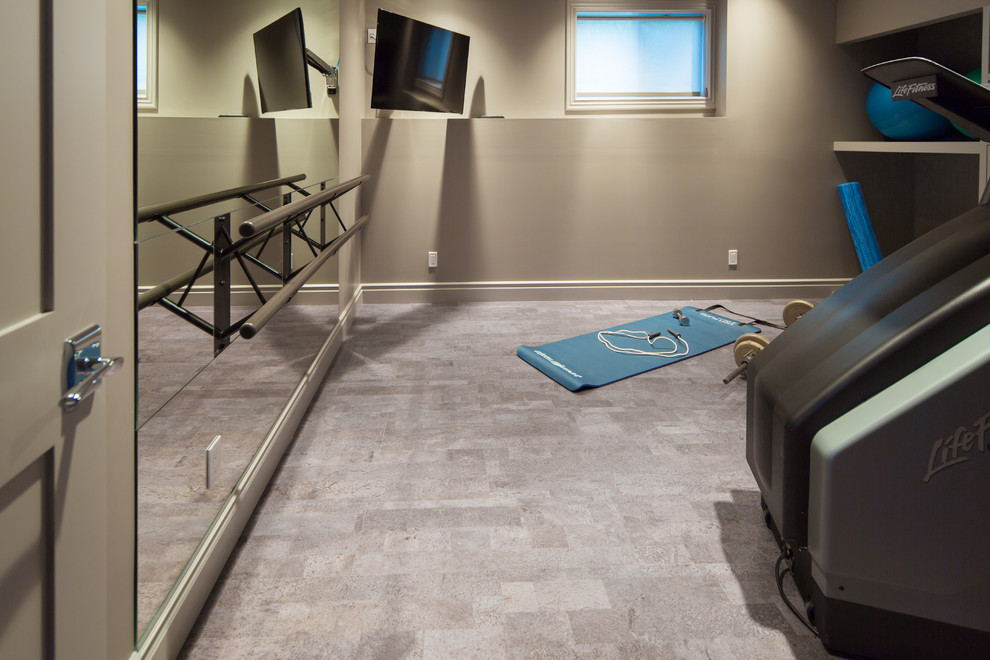 Design ideas for a mid-sized transitional home yoga studio in Calgary with grey walls.