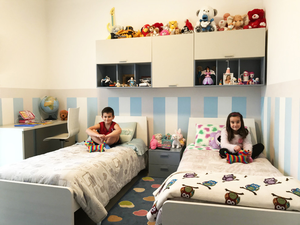 Mid-sized modern gender-neutral kids' bedroom in Other with multi-coloured walls, ceramic floors and pink floor for kids 4-10 years old.