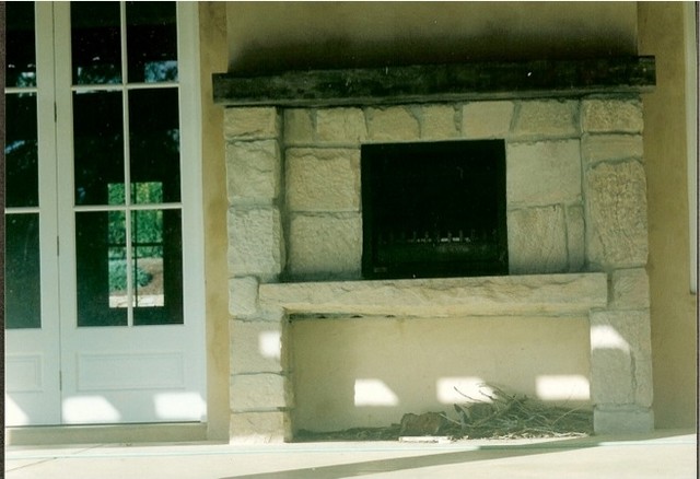 External fireplace farmhouse-exterior