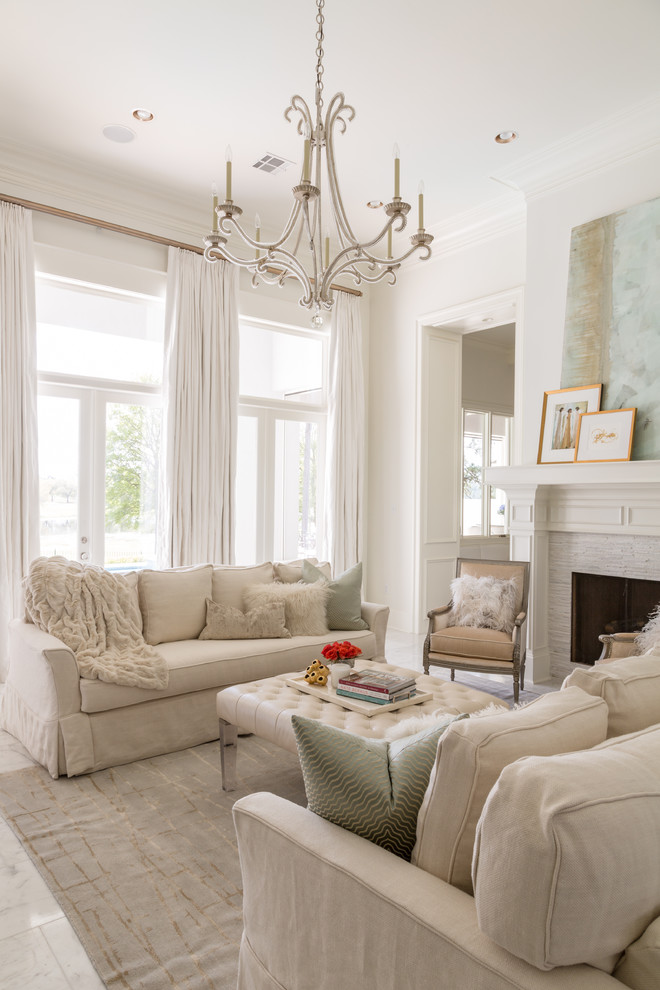 Design ideas for a large traditional enclosed living room in New Orleans with white walls and a standard fireplace.