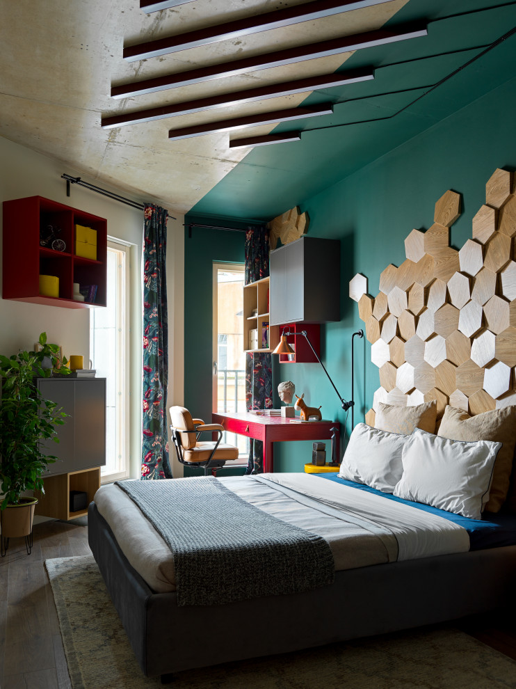 Inspiration for a mid-sized eclectic master laminate floor and brown floor bedroom remodel in Saint Petersburg with green walls