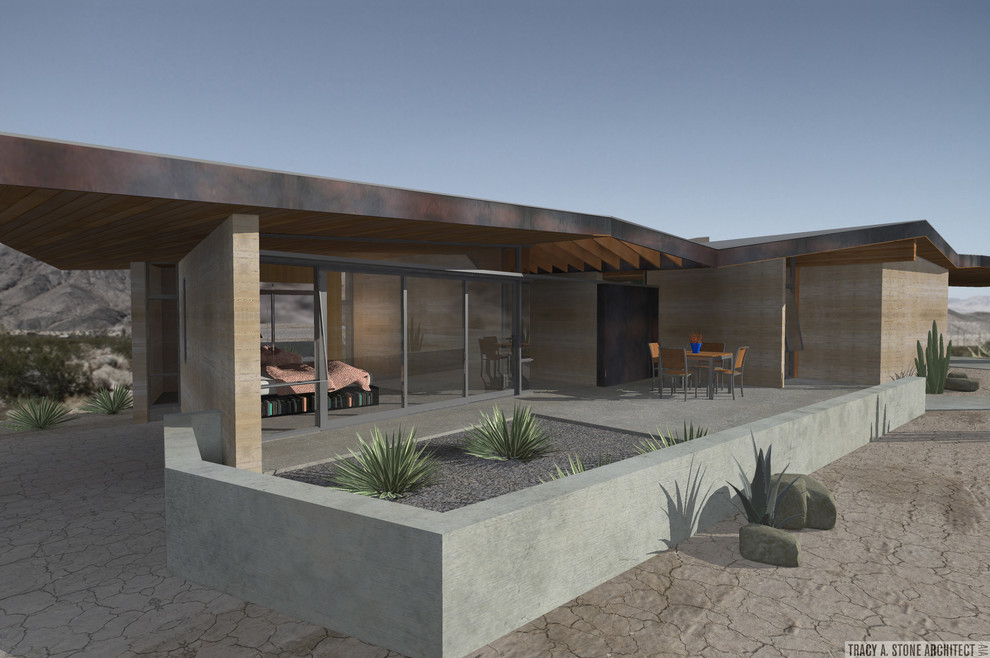 Design ideas for a small contemporary one-storey adobe multi-coloured house exterior in Los Angeles with a butterfly roof and a metal roof.