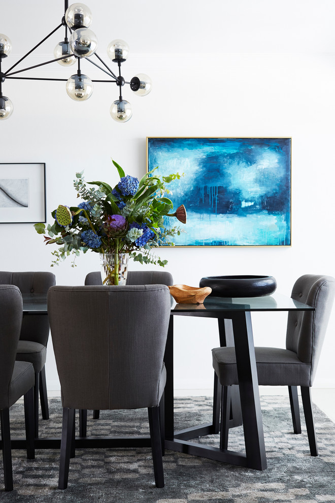 This is an example of a contemporary dining room in Brisbane.