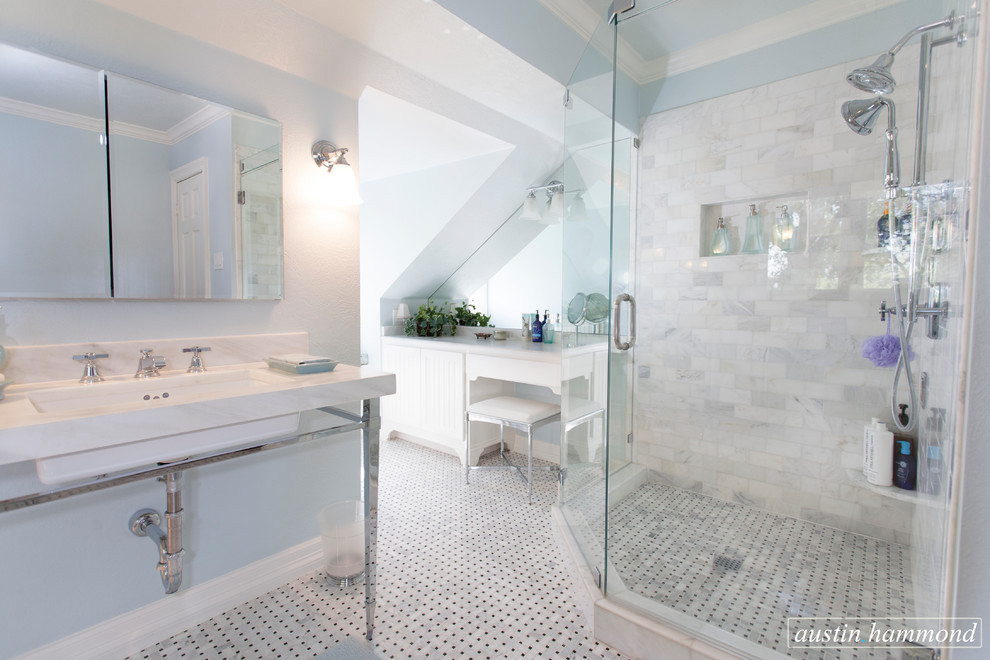 Photo of a large traditional master bathroom in Dallas with marble benchtops, a freestanding tub, an alcove shower, a two-piece toilet and white tile.