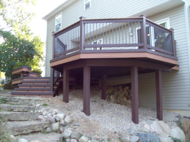 Two stage angular TREX TRANSCENDS TIKI TORCH DECK contemporary-terrace