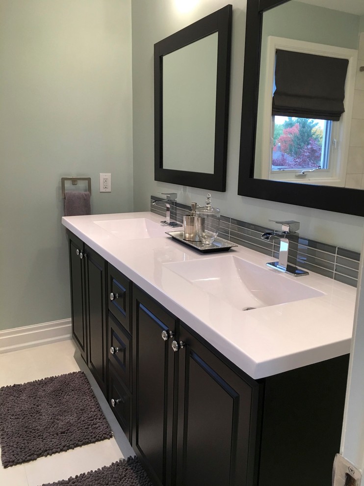 Inspiration for a mid-sized transitional kids' gray tile and porcelain tile porcelain tile double shower remodel in Toronto with shaker cabinets, dark wood cabinets, gray walls, an undermount sink and quartz countertops