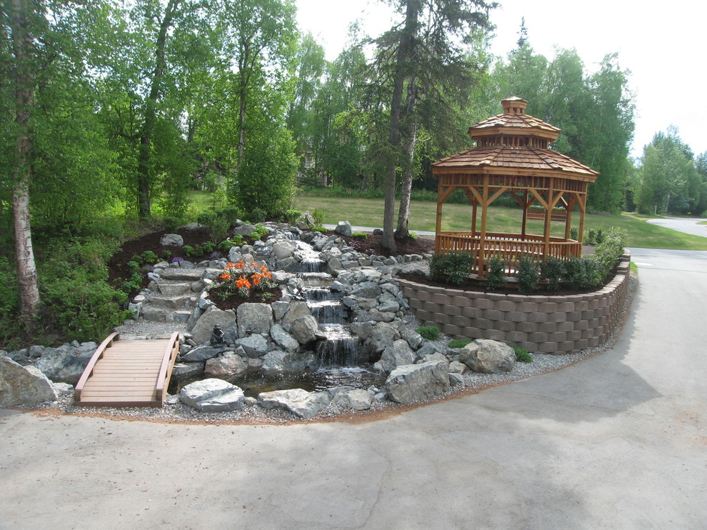 Design ideas for a large transitional full sun backyard pond.