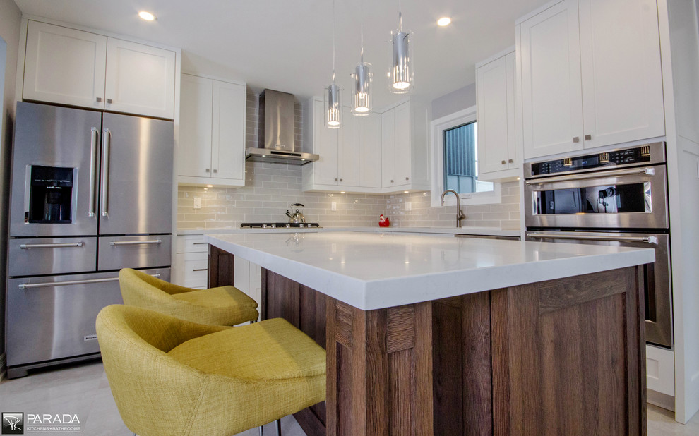 Example of a transitional kitchen design in Toronto