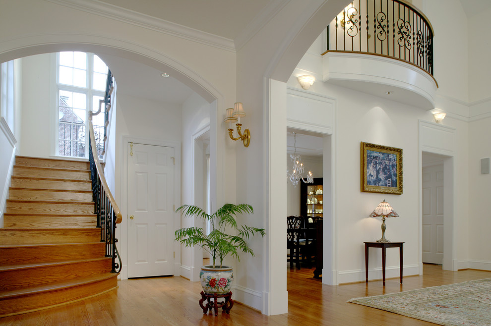 Photo of a traditional entryway in Baltimore with white walls.