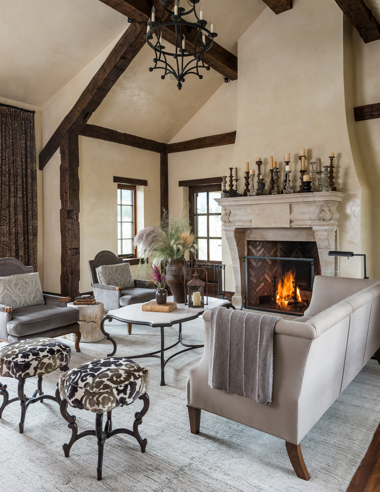 This is an example of a large country formal open concept living room in Other with beige walls, dark hardwood floors, a standard fireplace and a stone fireplace surround.