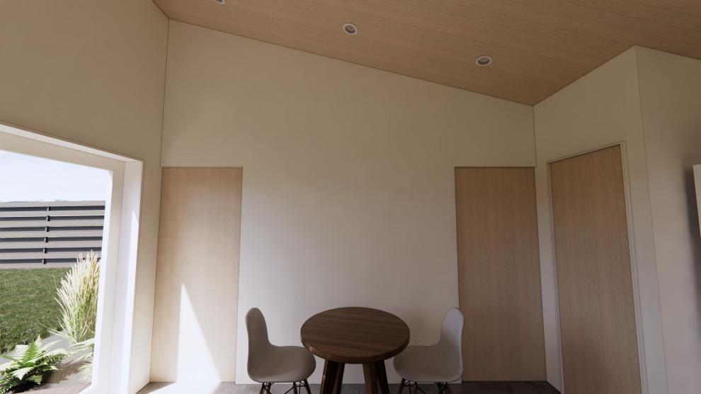 Inspiration för ett litet funkis allrum med öppen planlösning, med vita väggar, betonggolv, en fristående TV och grått golv