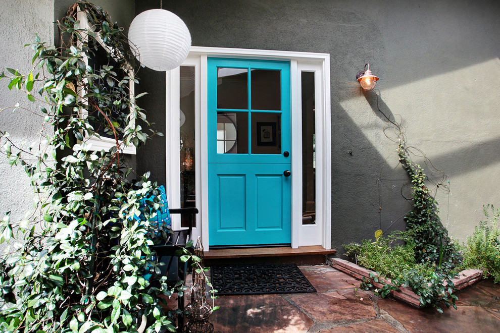 Inspiration for a transitional entryway in Other with a dutch front door.