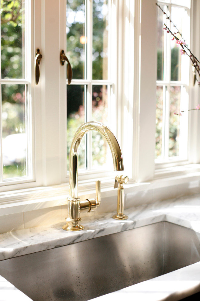 Example of a transitional kitchen design in Seattle