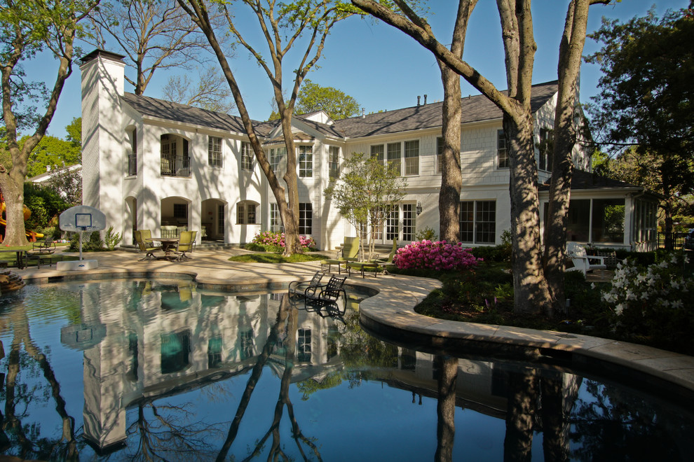 Inspiration for a traditional custom-shaped pool in Dallas.