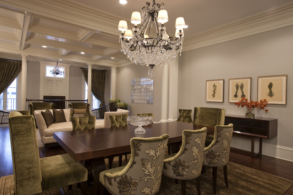 Photo of a traditional dining room in Chicago with grey walls and dark hardwood floors.