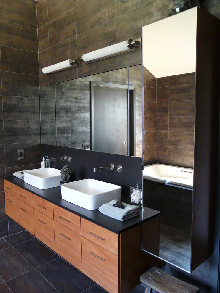 Contemporary bathroom in Houston with a vessel sink.