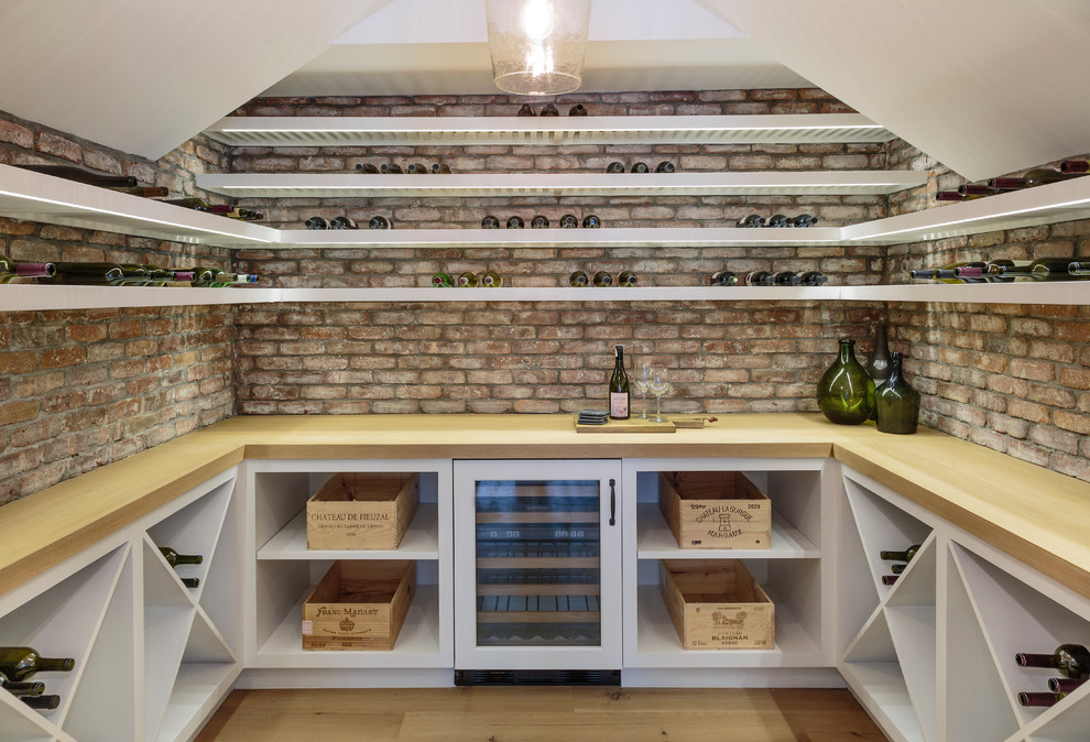 Photo of a mid-sized beach style wine cellar in Los Angeles.
