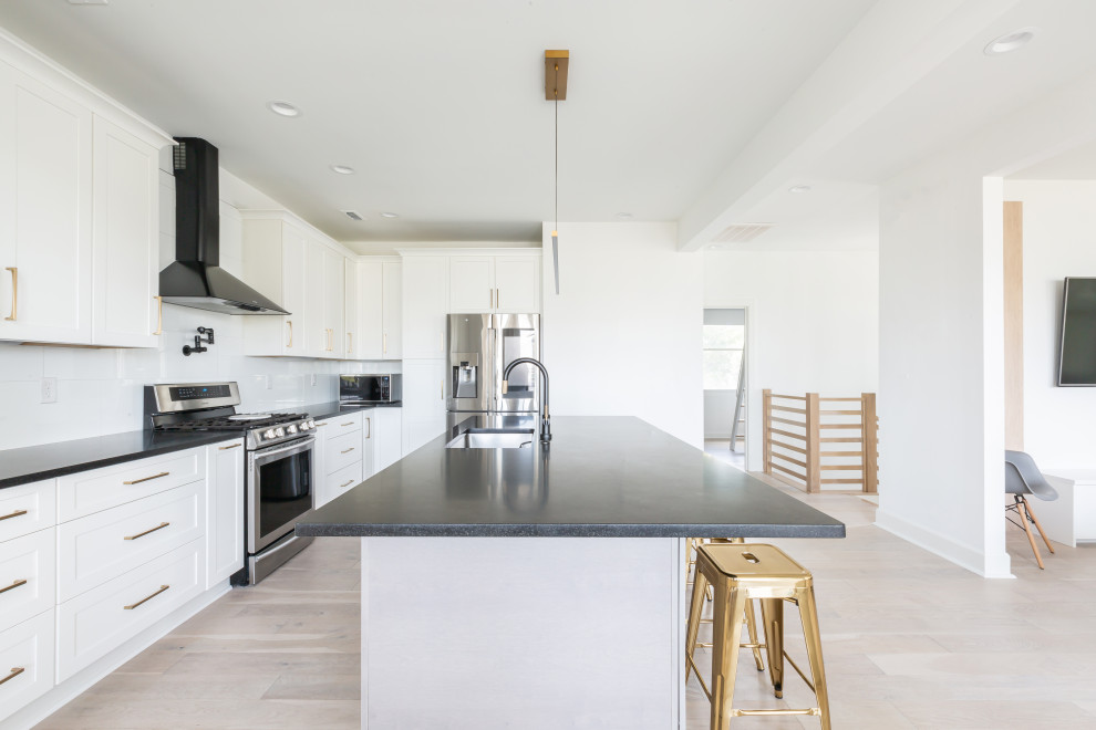 Example of a beach style kitchen design in Charleston