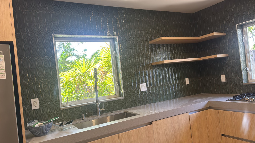 Kitchen - mid-sized modern kitchen idea in Miami with green backsplash and ceramic backsplash