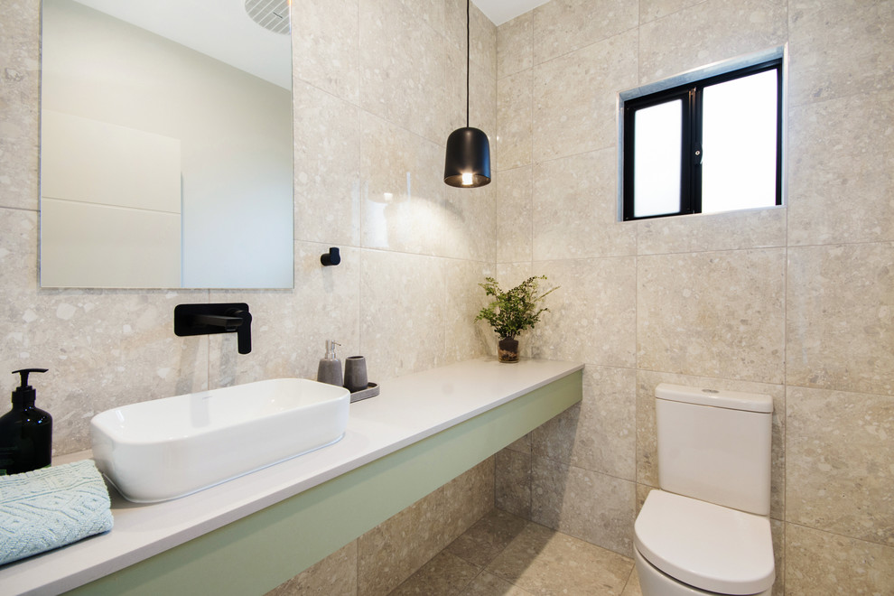 Design ideas for a contemporary powder room in Townsville.