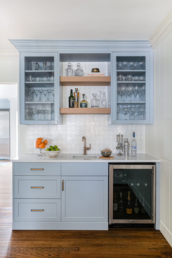 Inspiration for a transitional single-wall wet bar in Charlotte with an undermount sink, shaker cabinets, blue cabinets, quartz benchtops, white splashback and white benchtop.