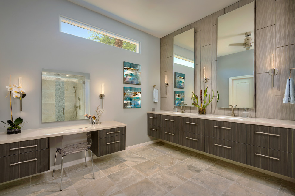 Photo of a contemporary bathroom in Phoenix with flat-panel cabinets, medium wood cabinets, a two-piece toilet, gray tile, porcelain tile, grey walls, porcelain floors, a drop-in sink, solid surface benchtops and with a sauna.