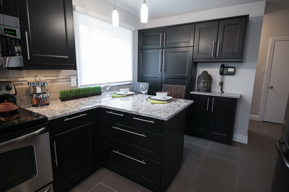 Transitional porcelain tile eat-in kitchen photo in Ottawa with an undermount sink, recessed-panel cabinets, quartz countertops, glass tile backsplash and stainless steel appliances
