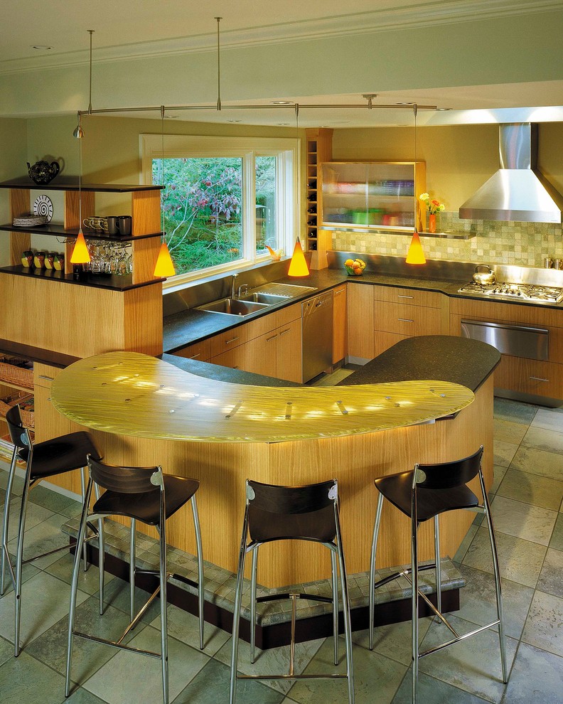 This is an example of a large contemporary l-shaped eat-in kitchen in Other with an undermount sink, flat-panel cabinets, light wood cabinets, beige splashback, ceramic splashback, stainless steel appliances, ceramic floors and with island.