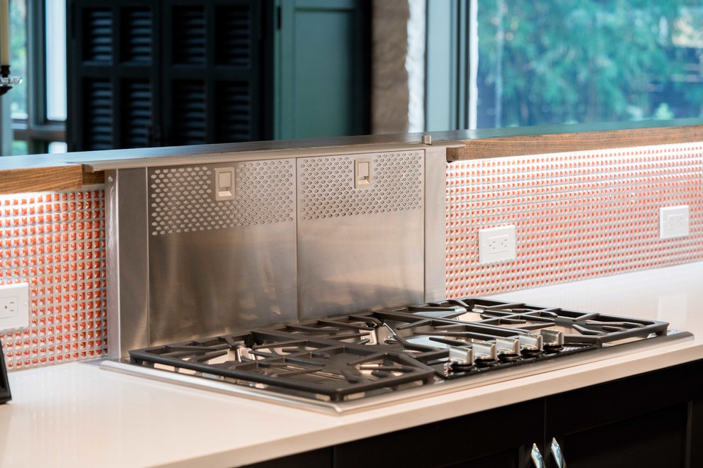 Kitchen - mid-sized transitional kitchen idea in Austin with flat-panel cabinets