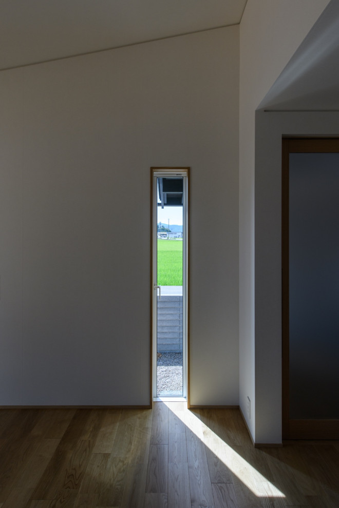 他の地域にあるおしゃれなリビングの写真