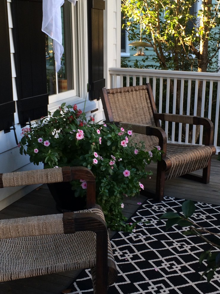 Mid-sized transitional porch idea in Charleston with decking and a roof extension