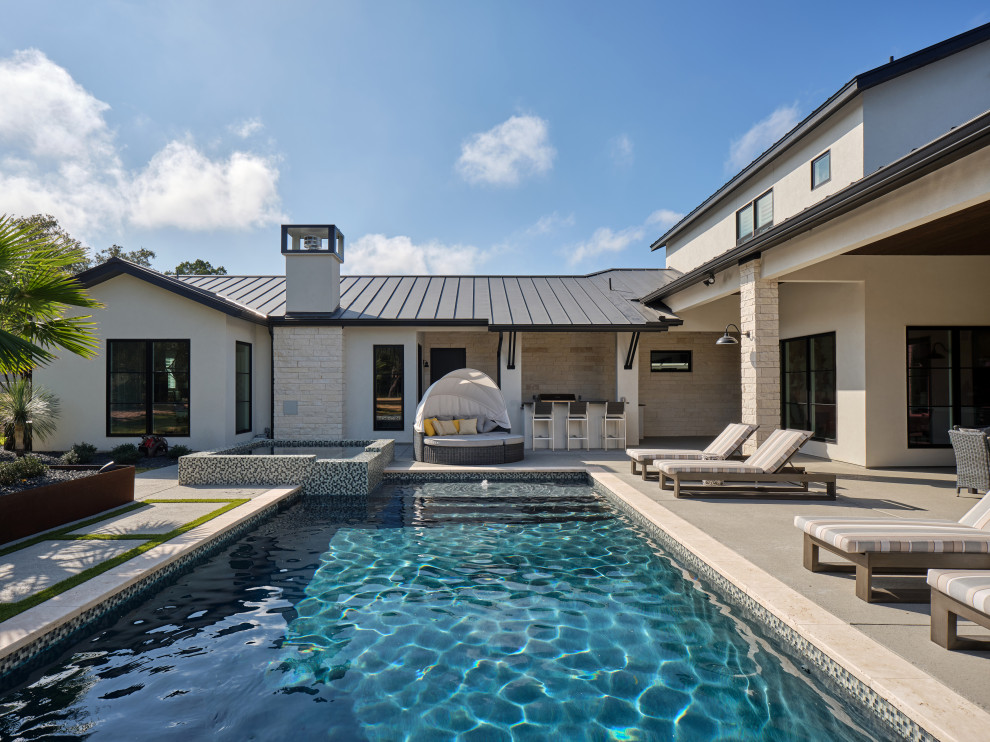 Inspiration for a transitional pool remodel in Austin