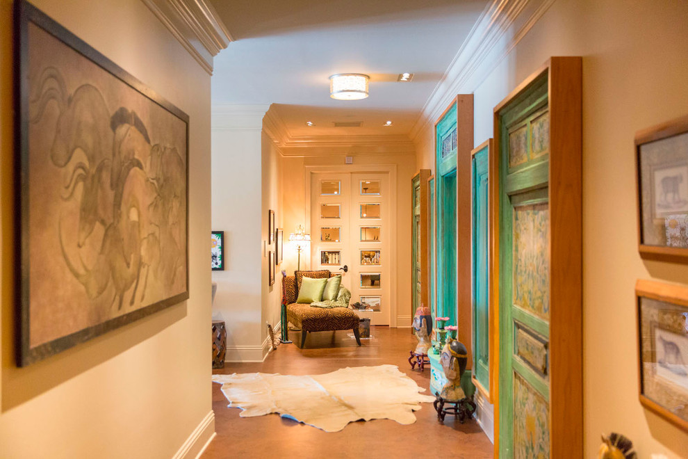 Design ideas for a large transitional hallway in Tampa with beige walls and cork floors.