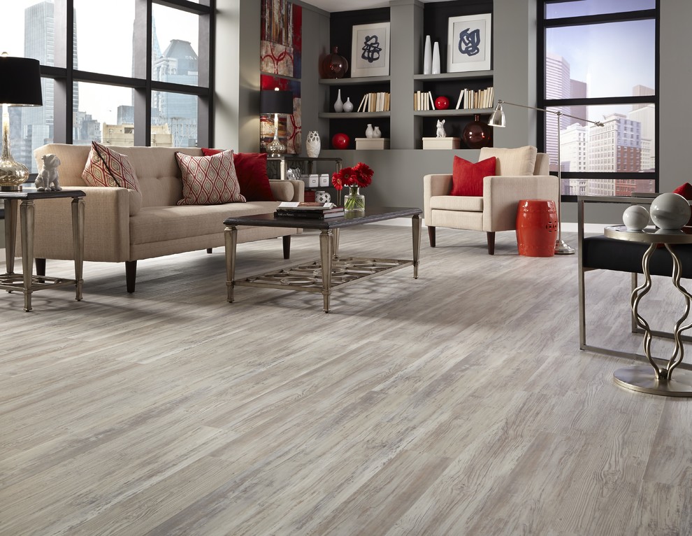 Example of a large minimalist formal and open concept medium tone wood floor and gray floor living room design with beige walls
