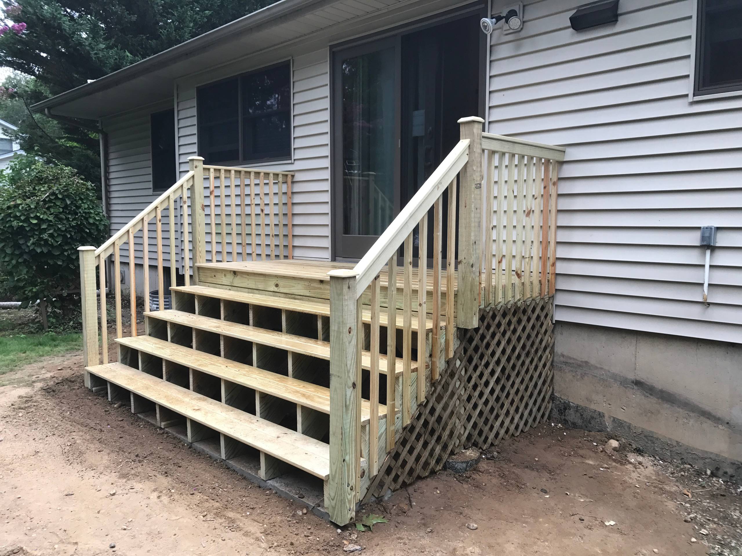 Small deck with wide stairs