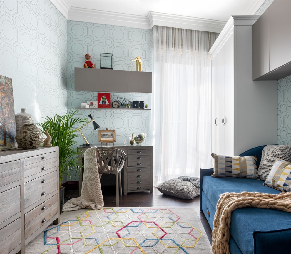 Photo of a contemporary gender-neutral kids' study room in Moscow with blue walls, dark hardwood floors and brown floor.
