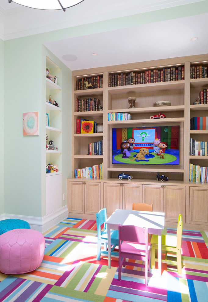 This is an example of a traditional gender-neutral kids' room in New York with carpet and green walls.