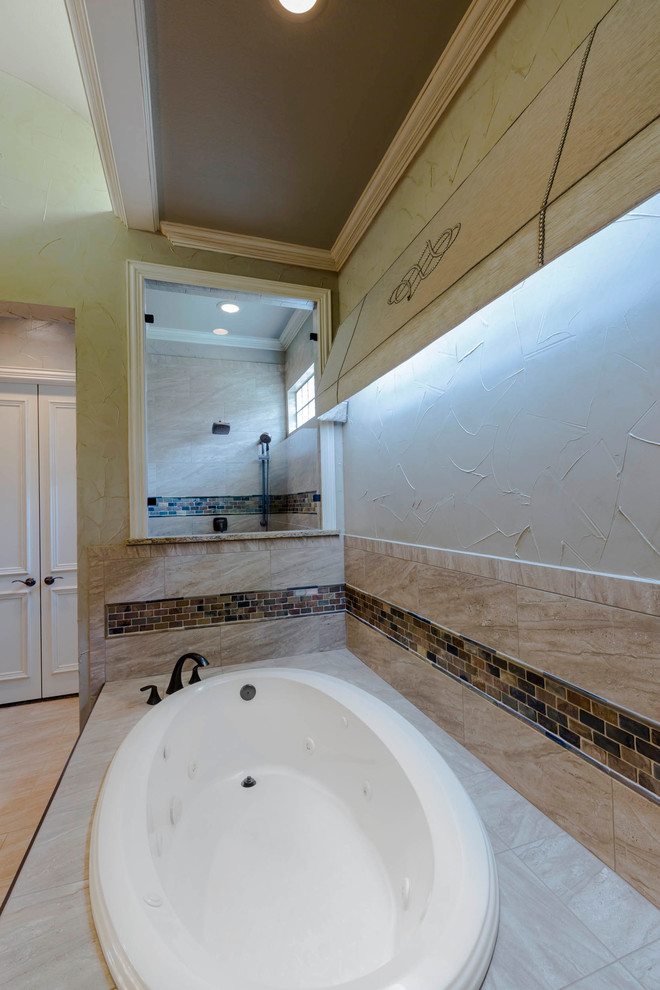 Transitional master bathroom photo in Dallas with an undermount sink, quartzite countertops and beige walls