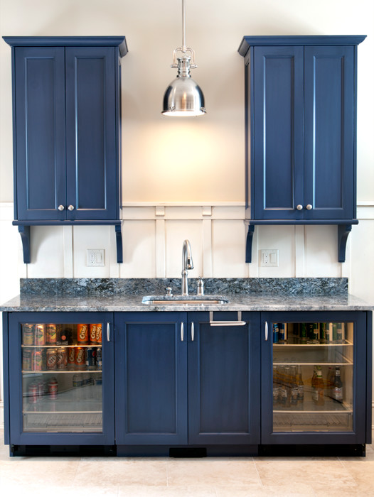 This is an example of a traditional home bar in Grand Rapids with blue benchtop.