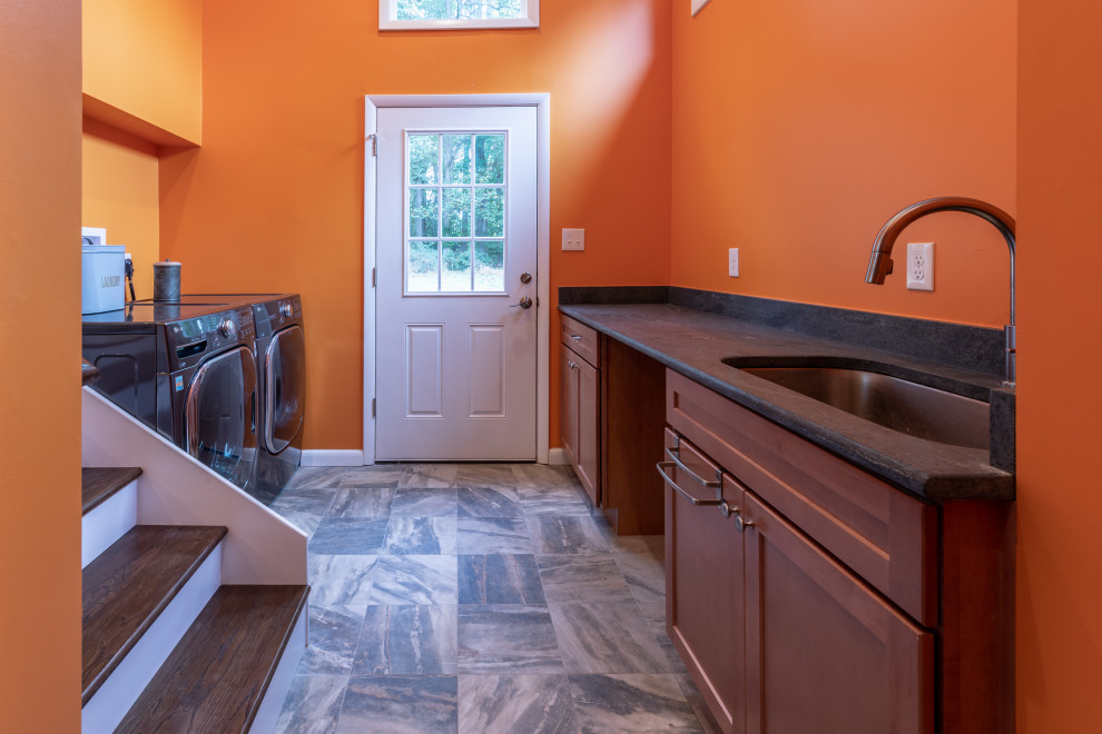 Design ideas for a mid-sized contemporary laundry room in DC Metro with granite benchtops.