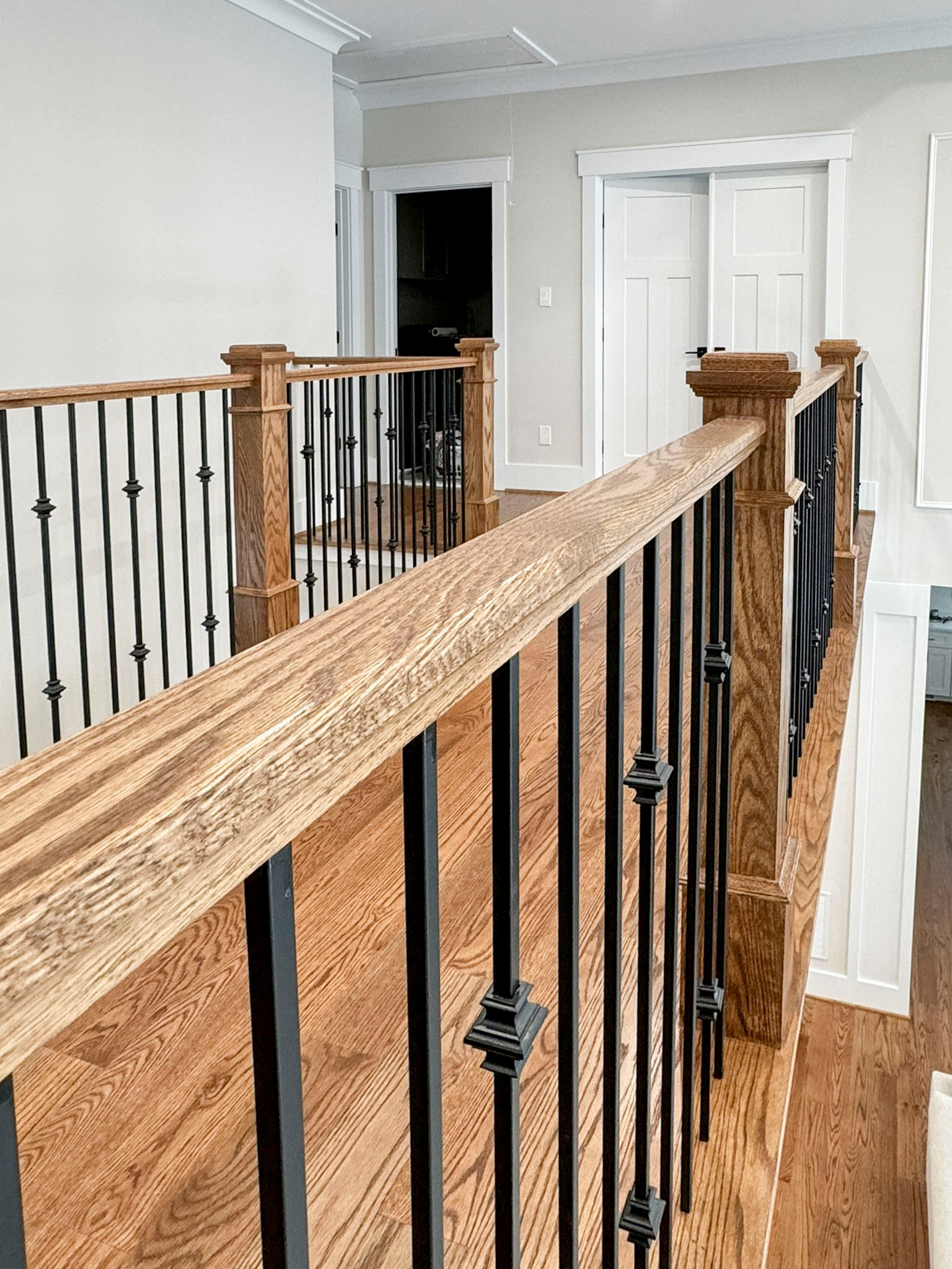 117_Distinct Oak Staircase with Iron Balusters & Oak Rail Profile, Chantilly VA