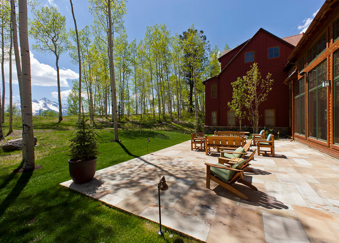 Example of a mountain style patio design in Denver