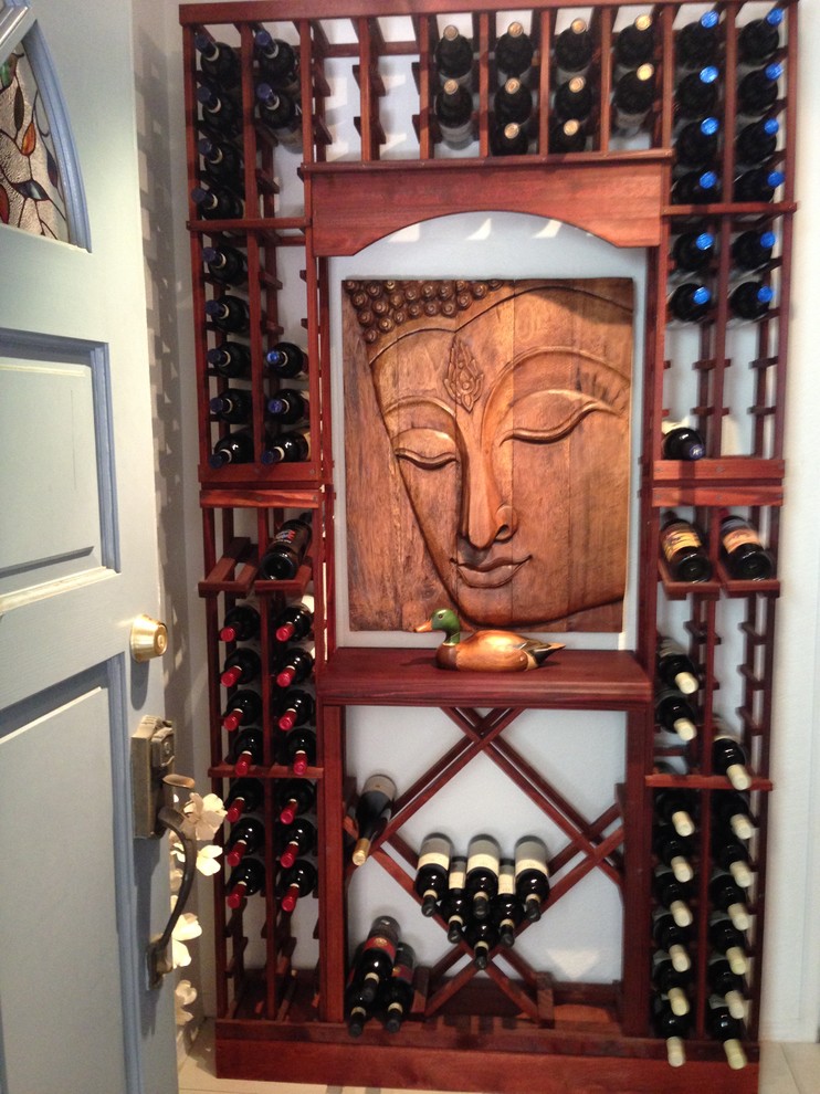 Small eclectic wine cellar in San Francisco with display racks.