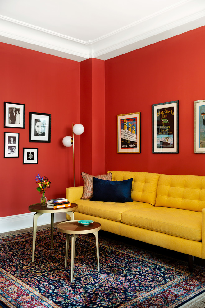 Inspiration for a midcentury family room in New York with red walls.
