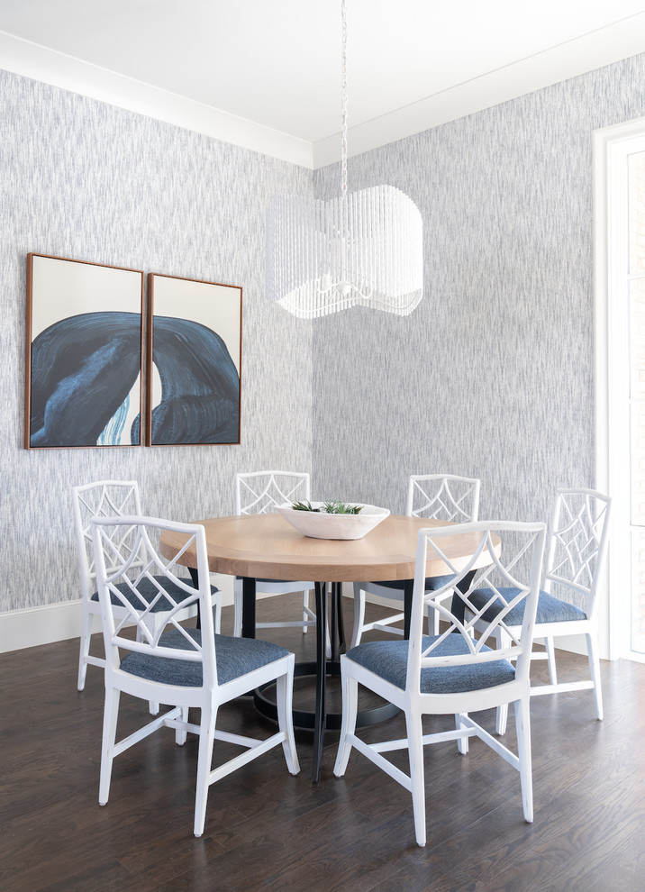 Example of a transitional dark wood floor and brown floor dining room design in Dallas with gray walls