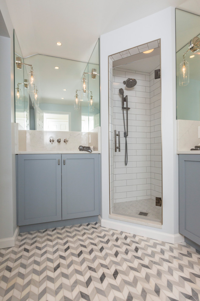 Inspiration for a mid-sized traditional kids bathroom in Cincinnati with recessed-panel cabinets, grey cabinets, an alcove shower, a one-piece toilet, white tile, ceramic tile, grey walls, marble floors, an undermount sink, quartzite benchtops, multi-coloured floor, a hinged shower door, white benchtops, a single vanity and a built-in vanity.