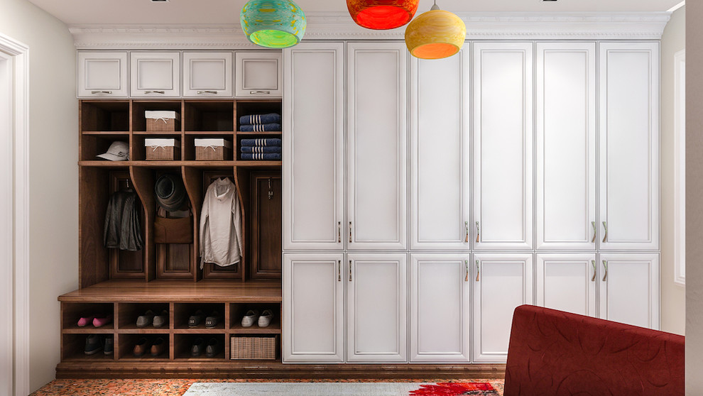 Inspiration for a mid-sized modern mudroom in Los Angeles with grey walls and medium hardwood floors.